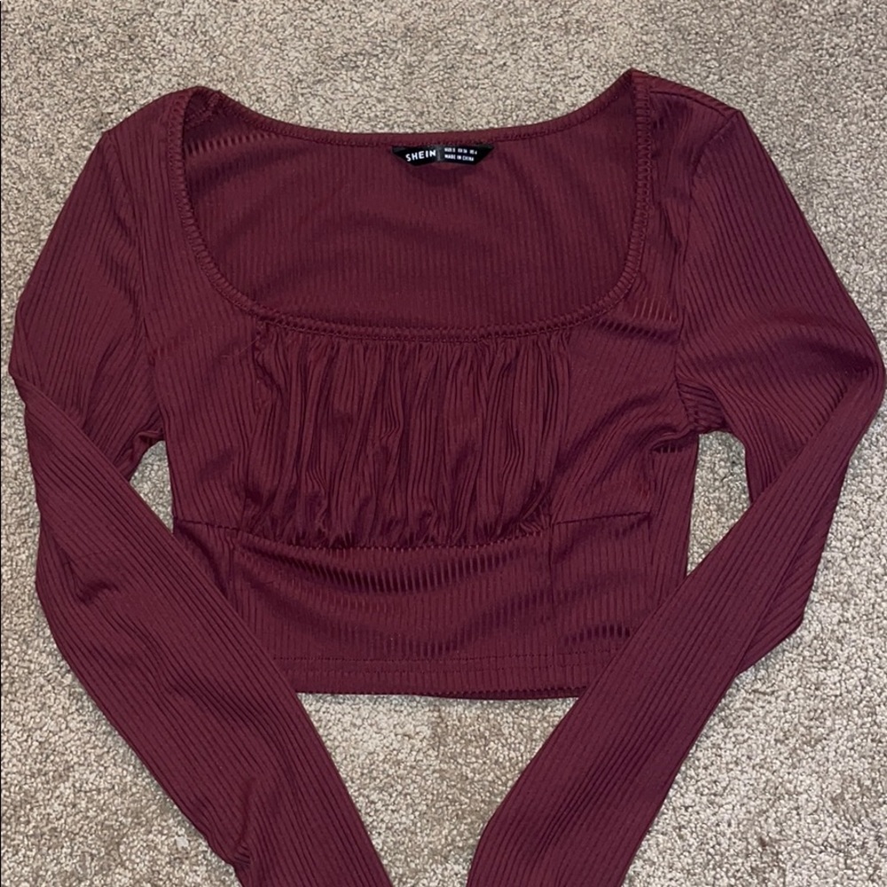maroon cropped long sleeved top
